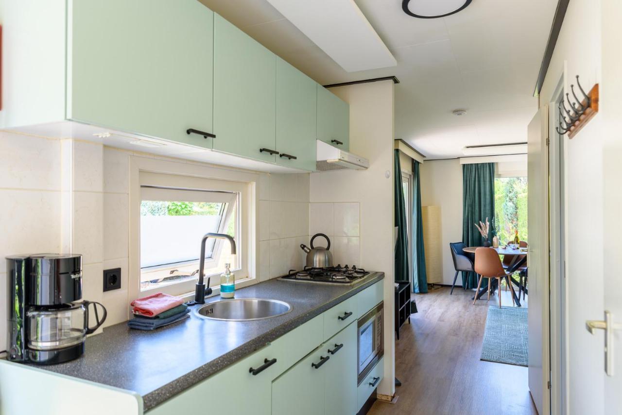 Gezellig Chalet Aan De Veluwse Bosrand พุทเทิน ภายนอก รูปภาพ